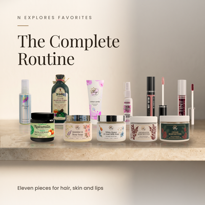 N Explores Favorites Complete Routine, all eleven ANG We Care products on a travertine shelf